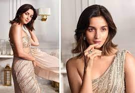 Alia Bhatt Shines in Gilded Saree for First Appearance as L'Oréal Ambassador